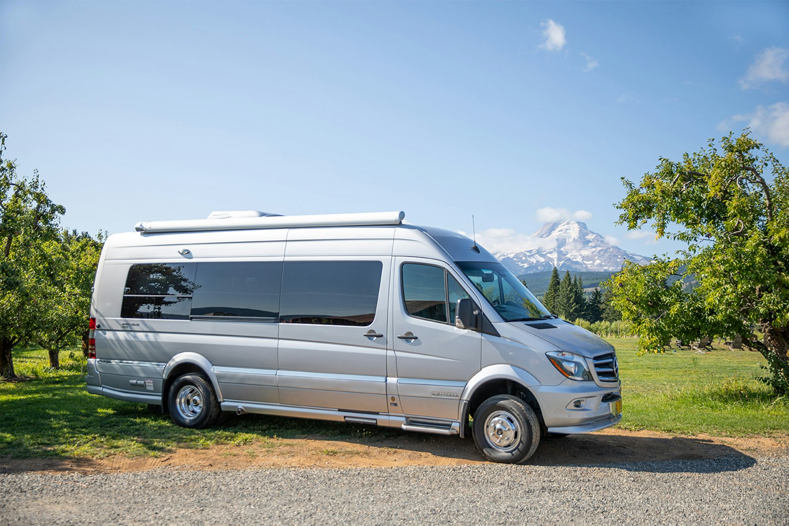 white van on road during daytime with RV Total Loss Replacement Coverage